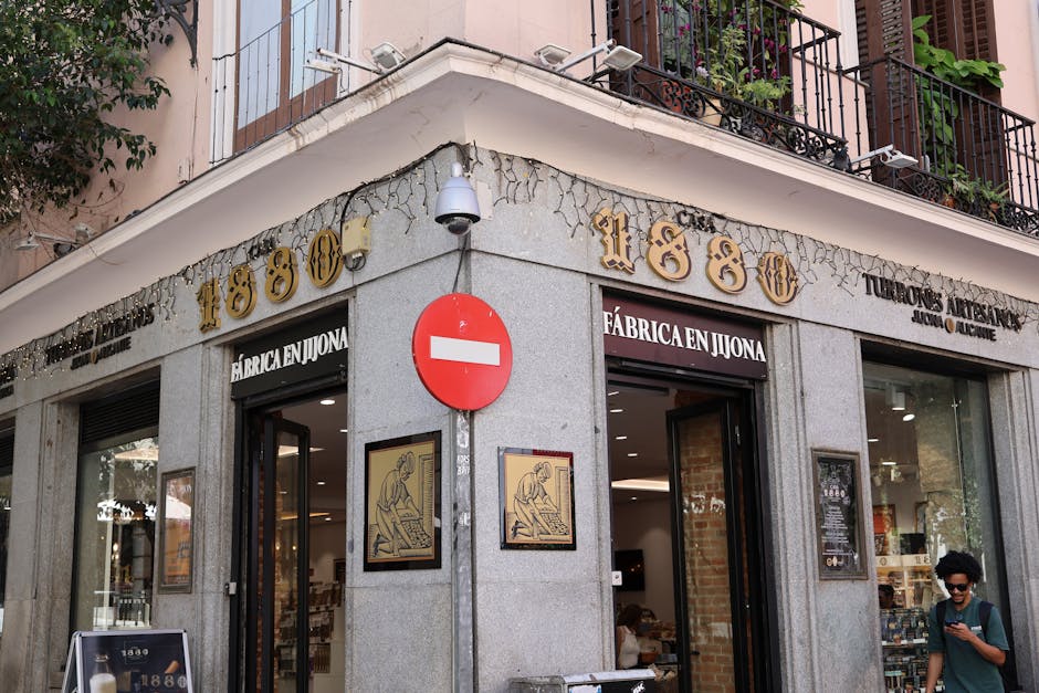 Exterior of a historic nougat shop in Alicante, Spain, showcasing traditional architecture.