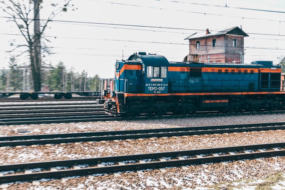 A vibrant locomotive on railway tracks in Trzebinia, Lesser Poland Voivodeship, Poland.